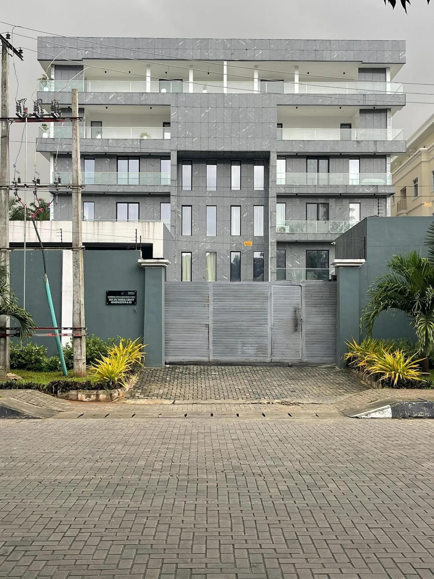 Pelican Cove behind its gated entrance and paved forecourt