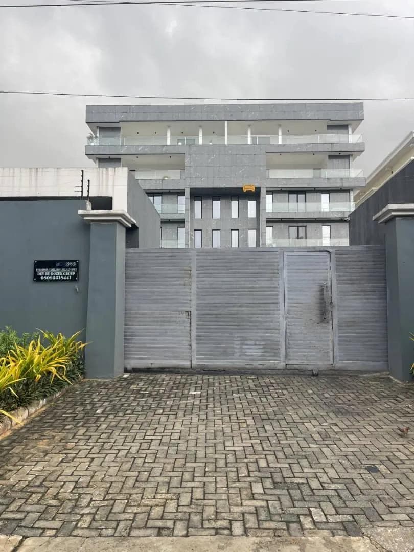 Pelican Cove from the street, with resident parking along the frontage